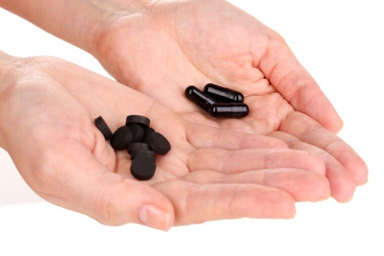 Cărbune activ pentru pierderea în greutate în tablete și capsule